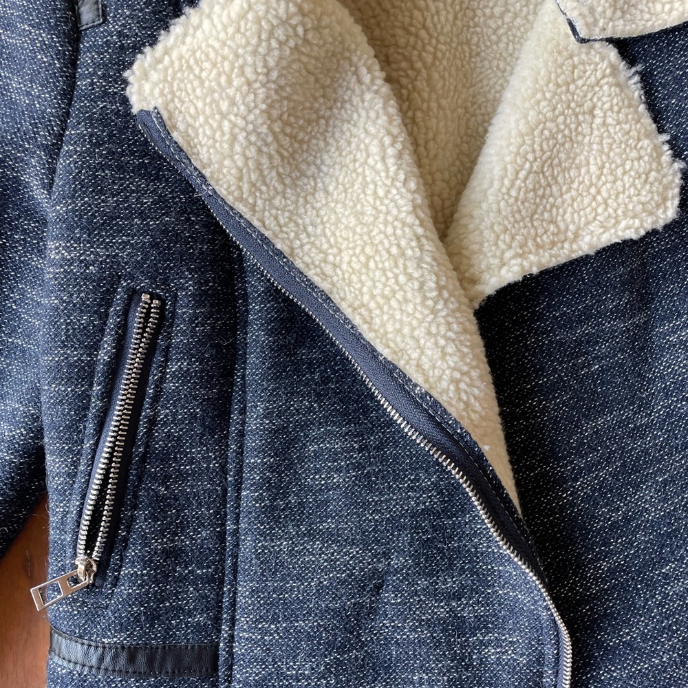 Couleur blue crop jacket with leather trim details sherpa interior.